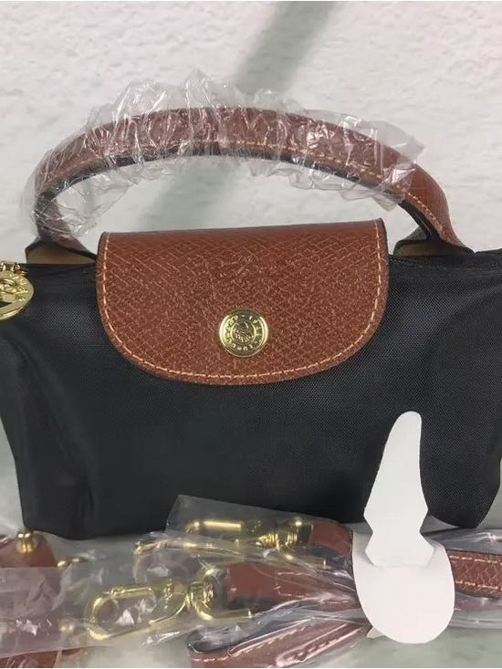 Longchamp Handbags - Longchamp Black Nylon Mini Bag with Brown Trim and Gold Hardware